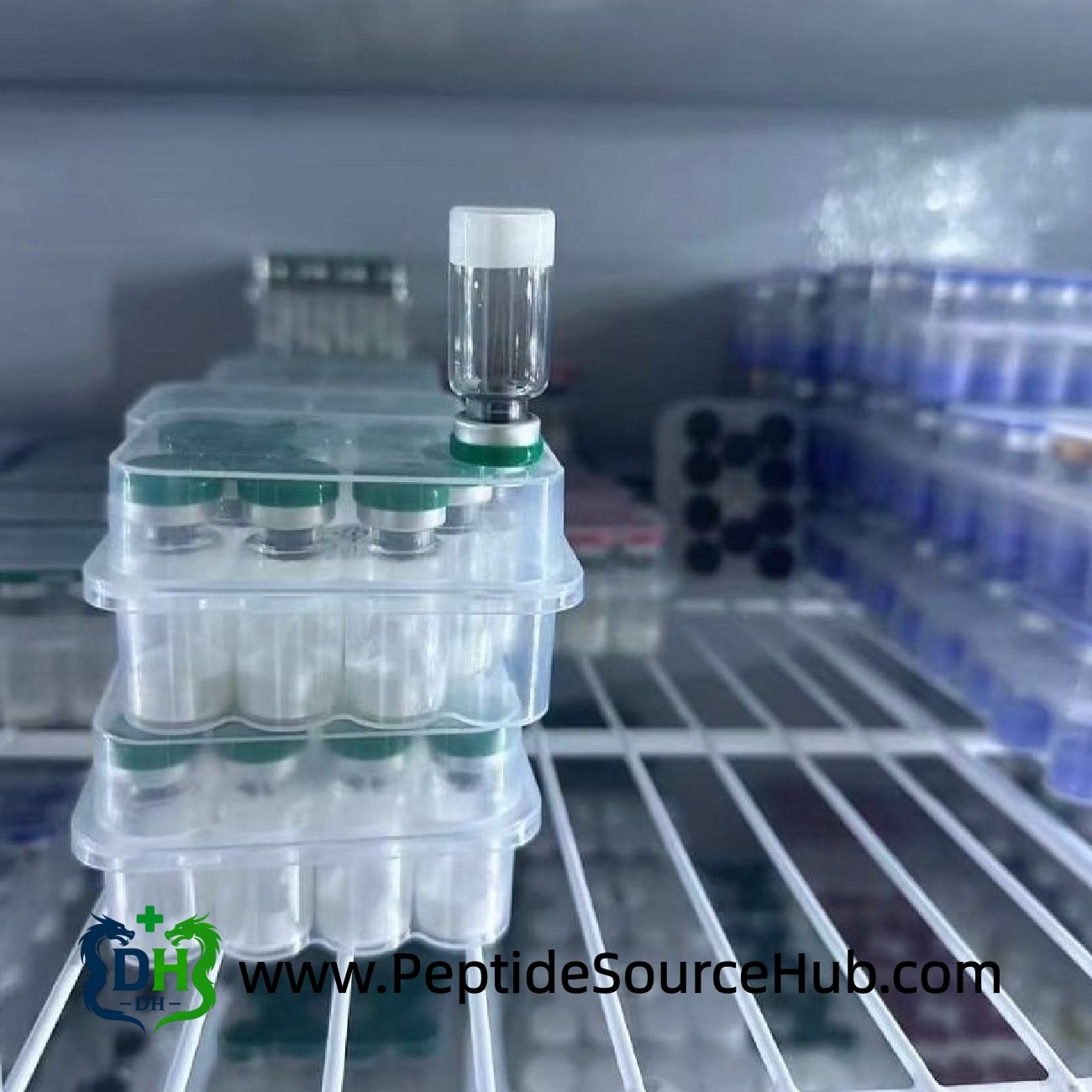 ACE-031 peptide kit stacked trays — storage shelf with vial set