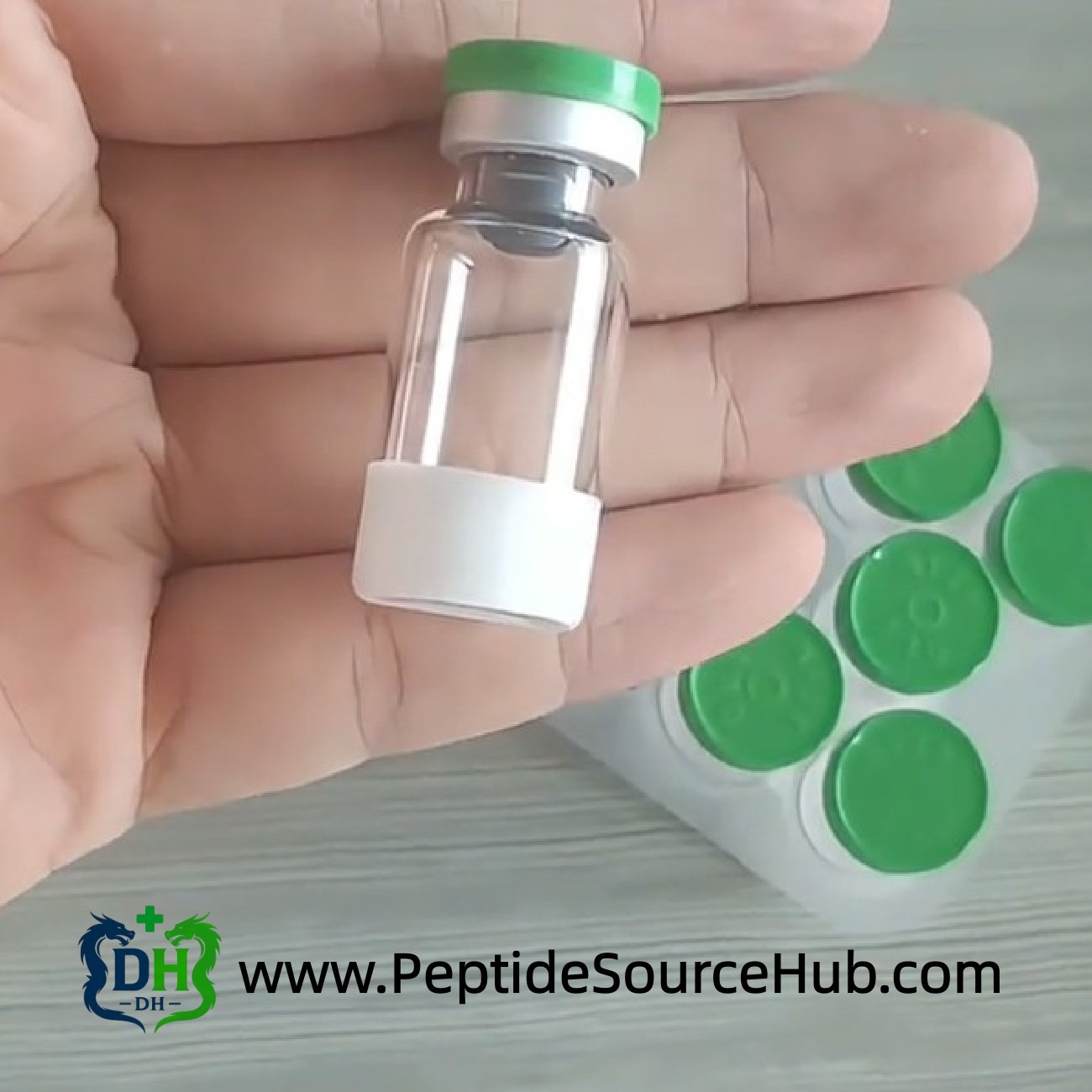 ACE-031 peptide vial in hand — vial format demonstration