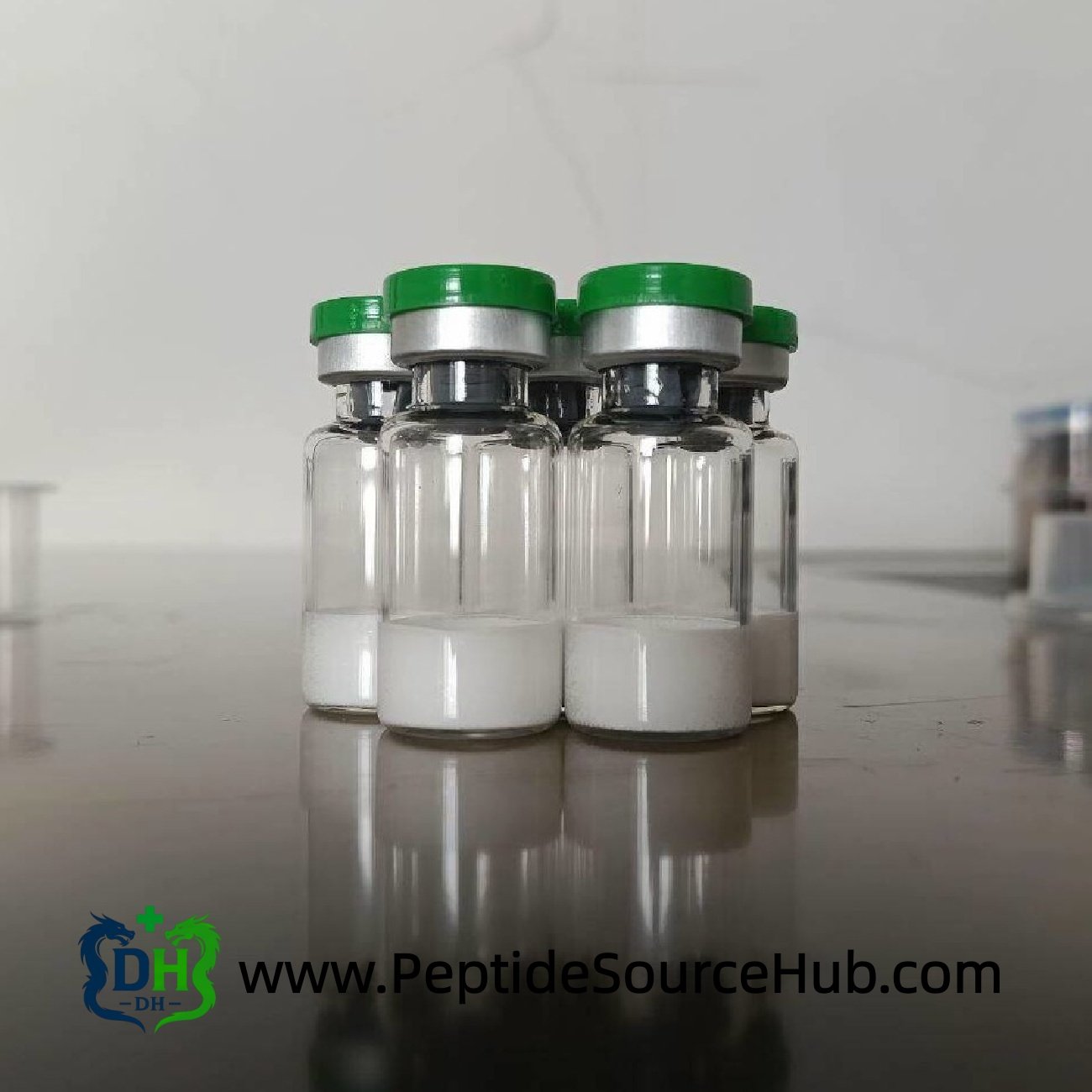 ACE-031 peptide vials close-up — lyophilized powder format