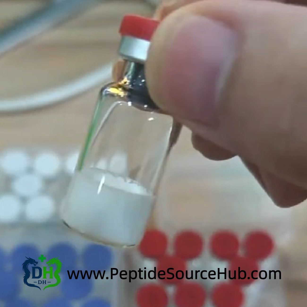 Close-up peptide vial showing white lyophilized powder inside