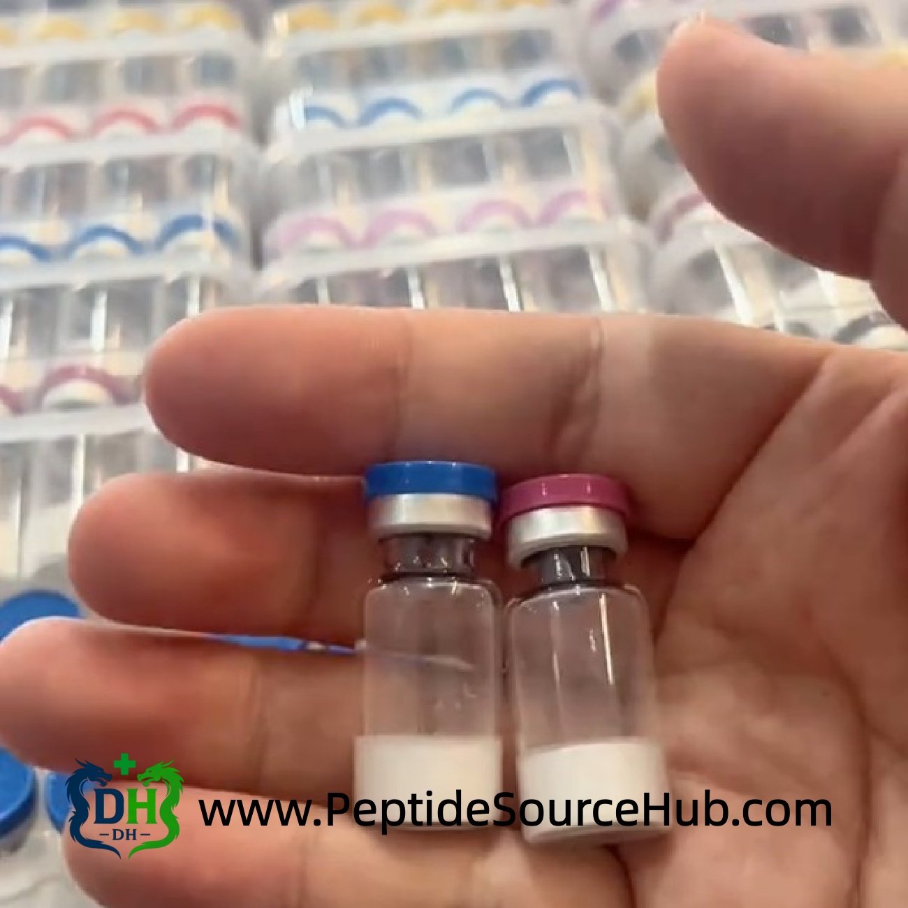 Hand holding two small vials for BPC-157 5 mg + TB-500 5 mg Blend, lyophilized powder close-up