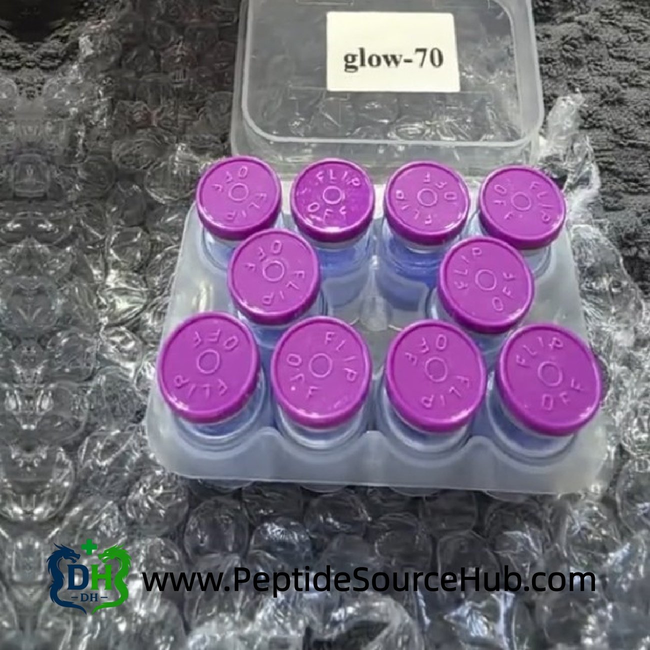 Glow 70 mg purple cap peptide tray on bubble wrap