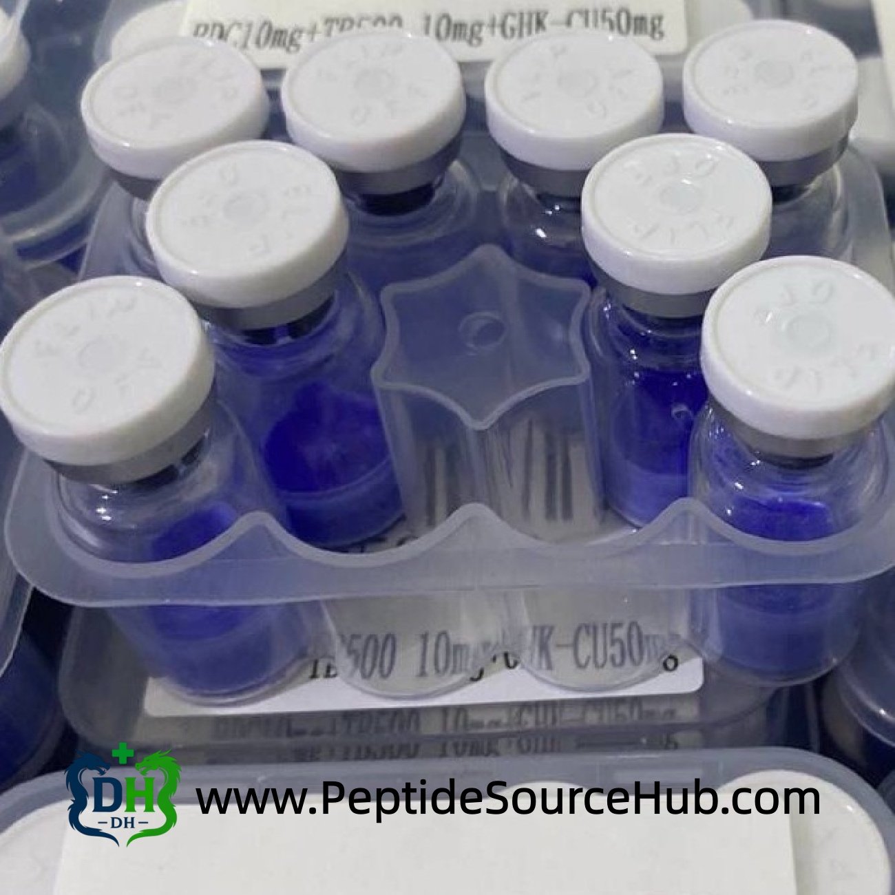 Glow blue copper peptide vials with white caps in tray