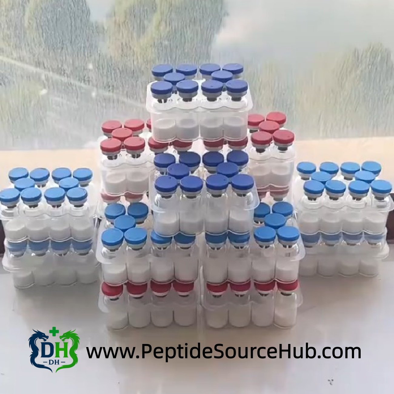 Custom-Dose HGH vials stacked in red and blue cap pyramid