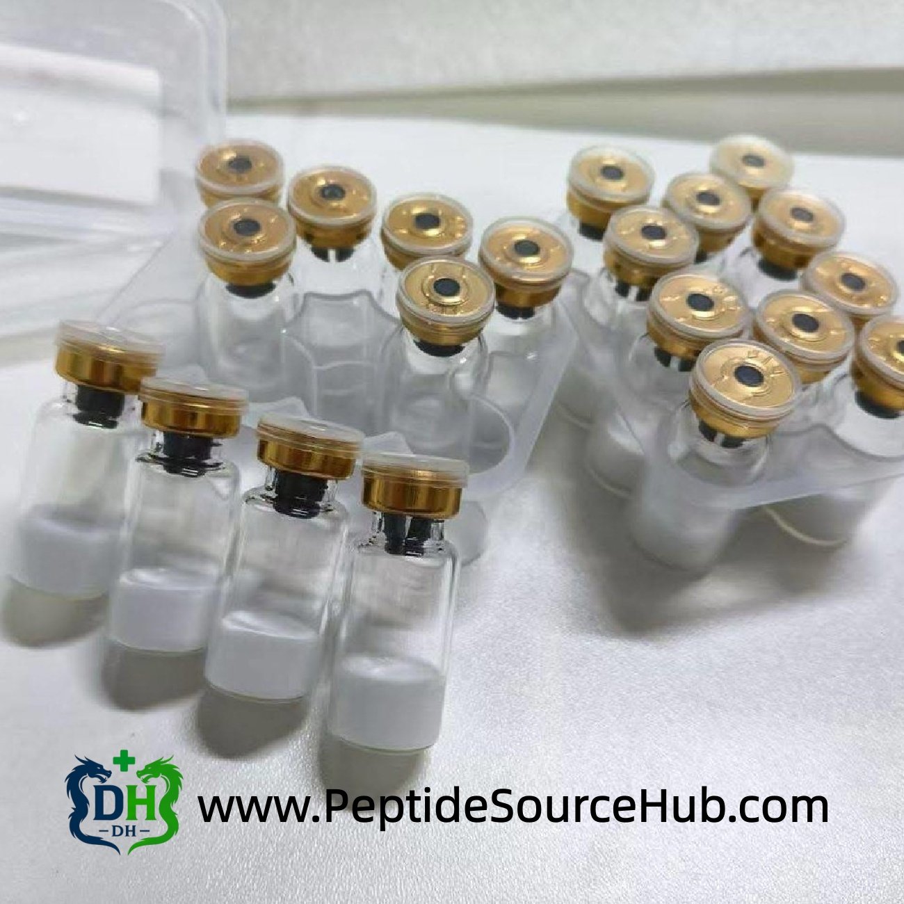 Custom-Dose HGH vials with gold caps in plastic tray