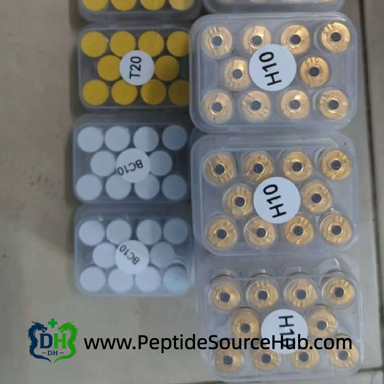 Custom HGH 6–36 IU gold cap vials labeled H10 in trays