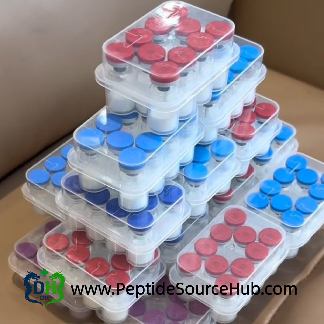 Stacked trays of Follistatin-344 peptide kits forming a pyramid