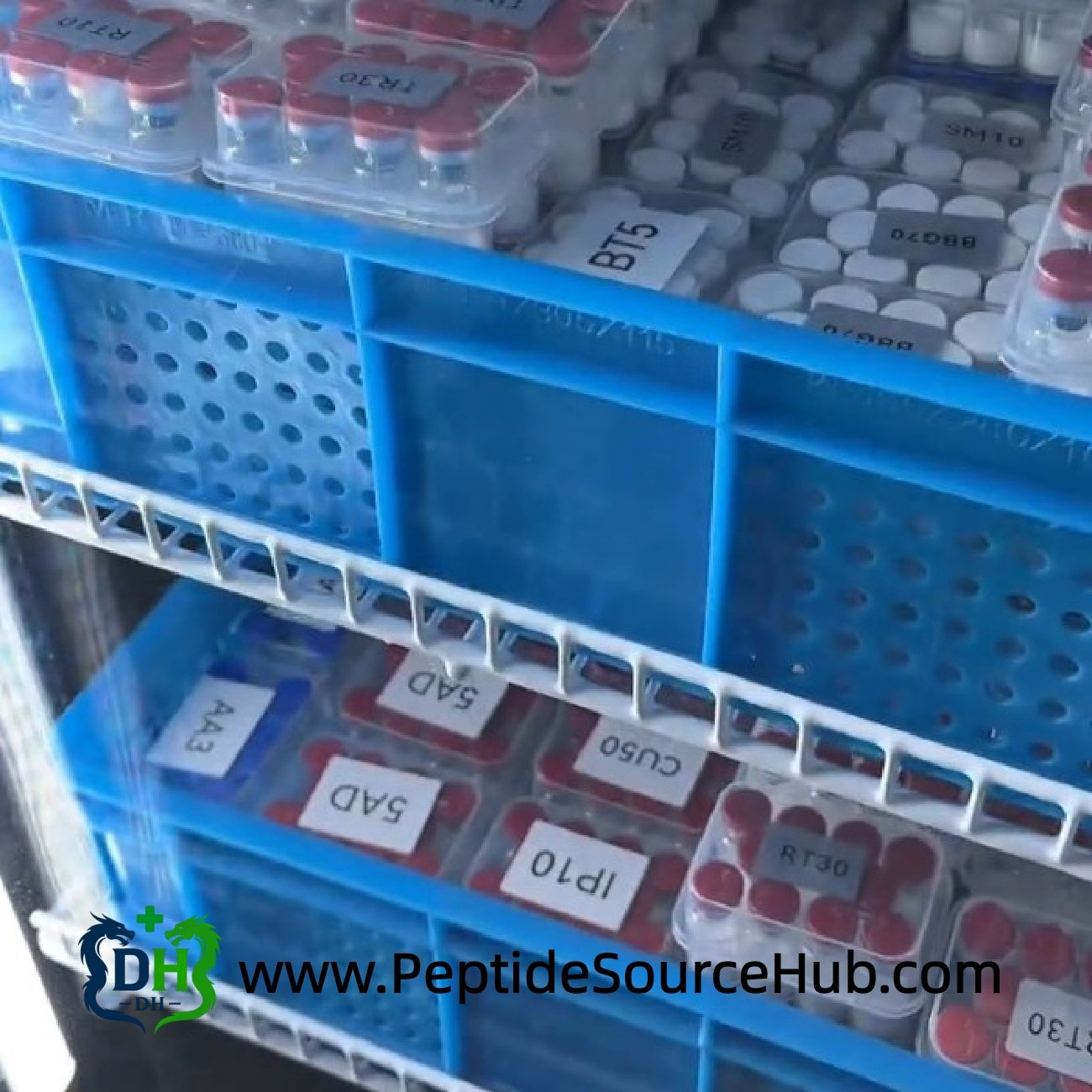 Peptide trays including Ipamorelin stored in blue rack system