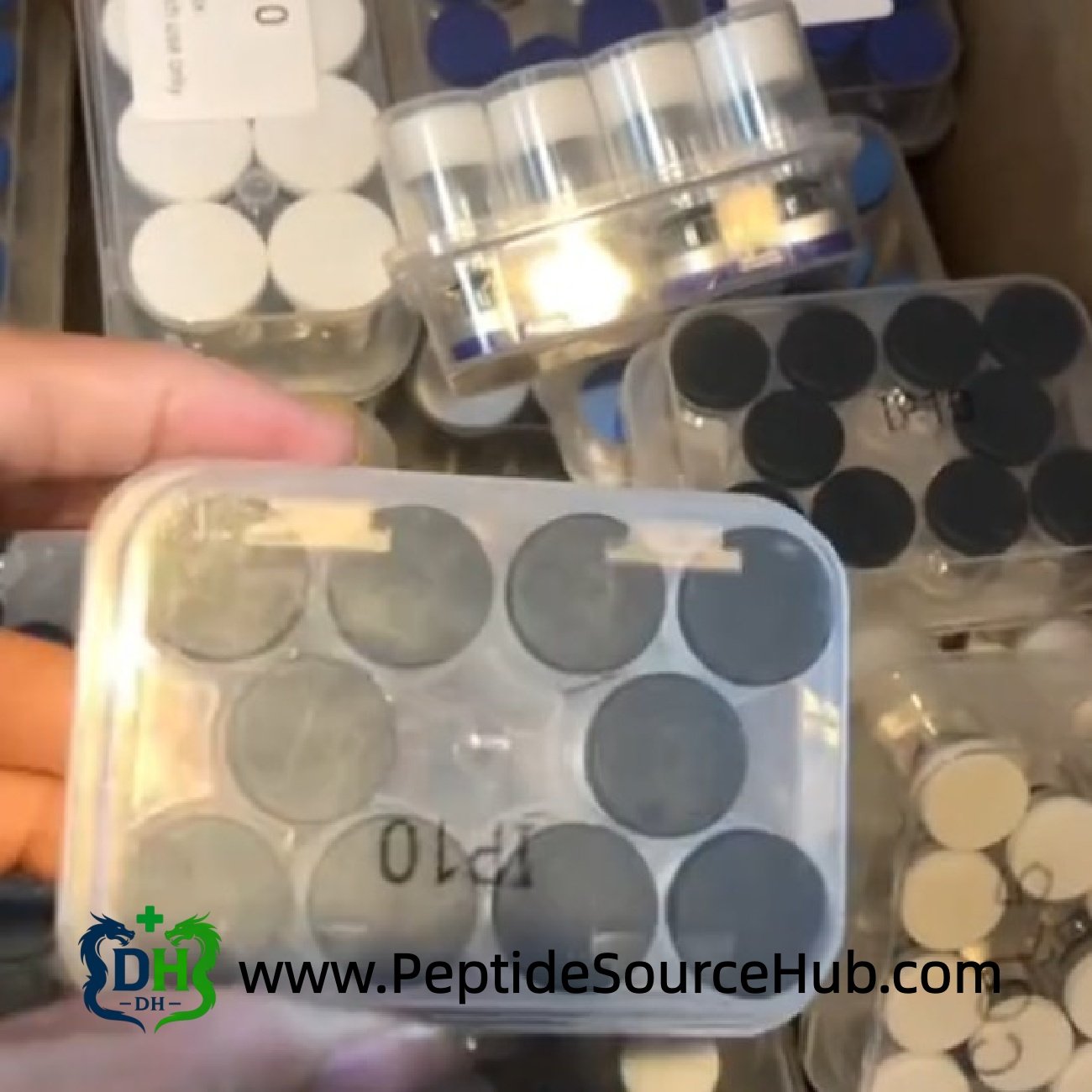 Ipamorelin and other peptide kits stored in carton