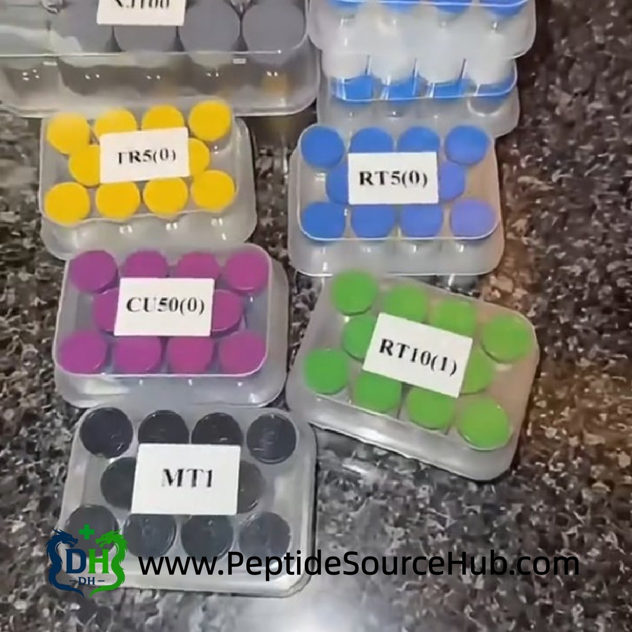 Assorted peptide trays with MT1 kit in foreground