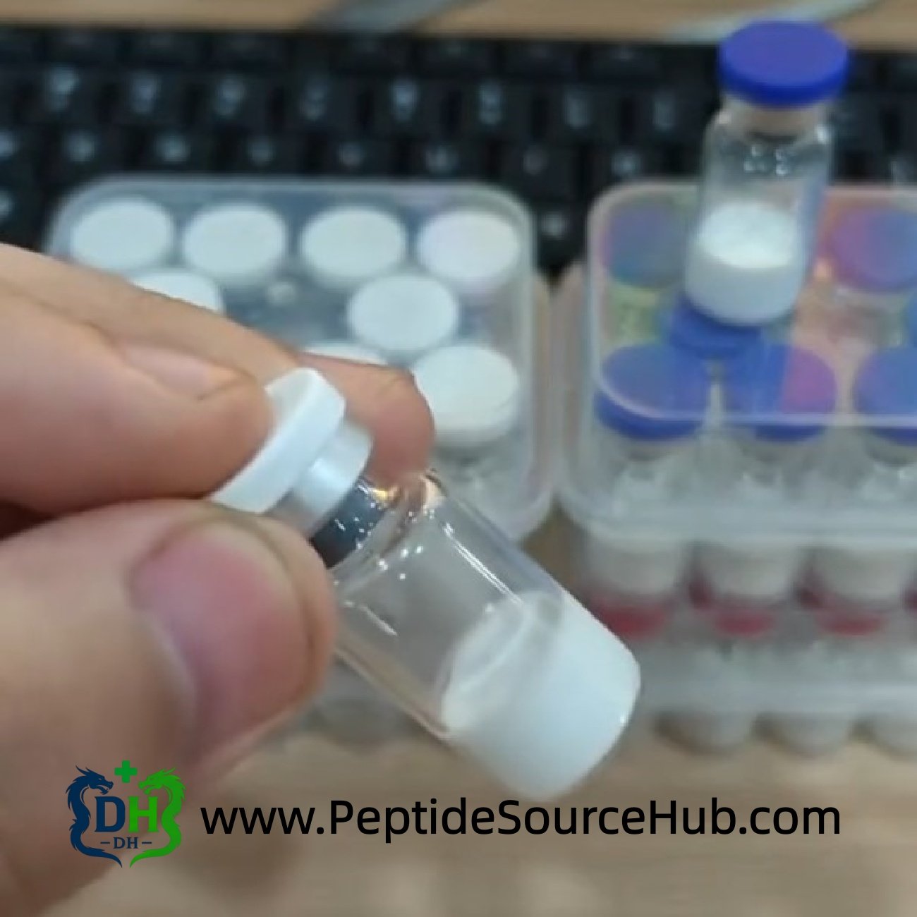 Hand holding Melanotan I MT1 10 mg vial close-up