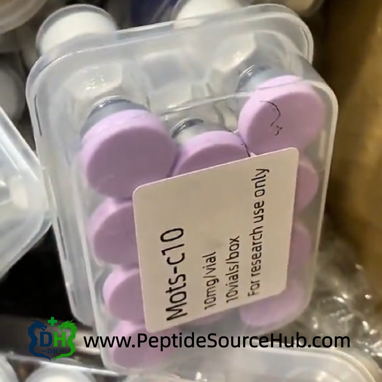 MOTS-C 10 mg peptide vials with light purple caps in tray