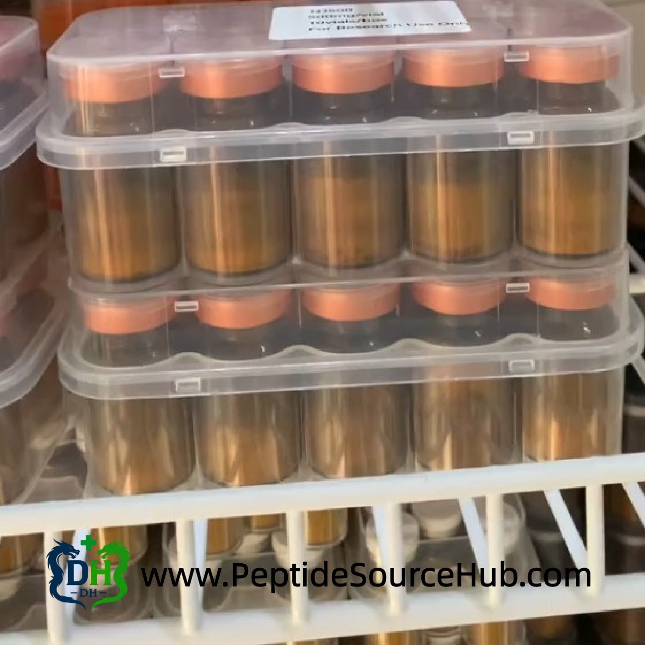 NAD+ amber vials with yellow powder stacked in freezer