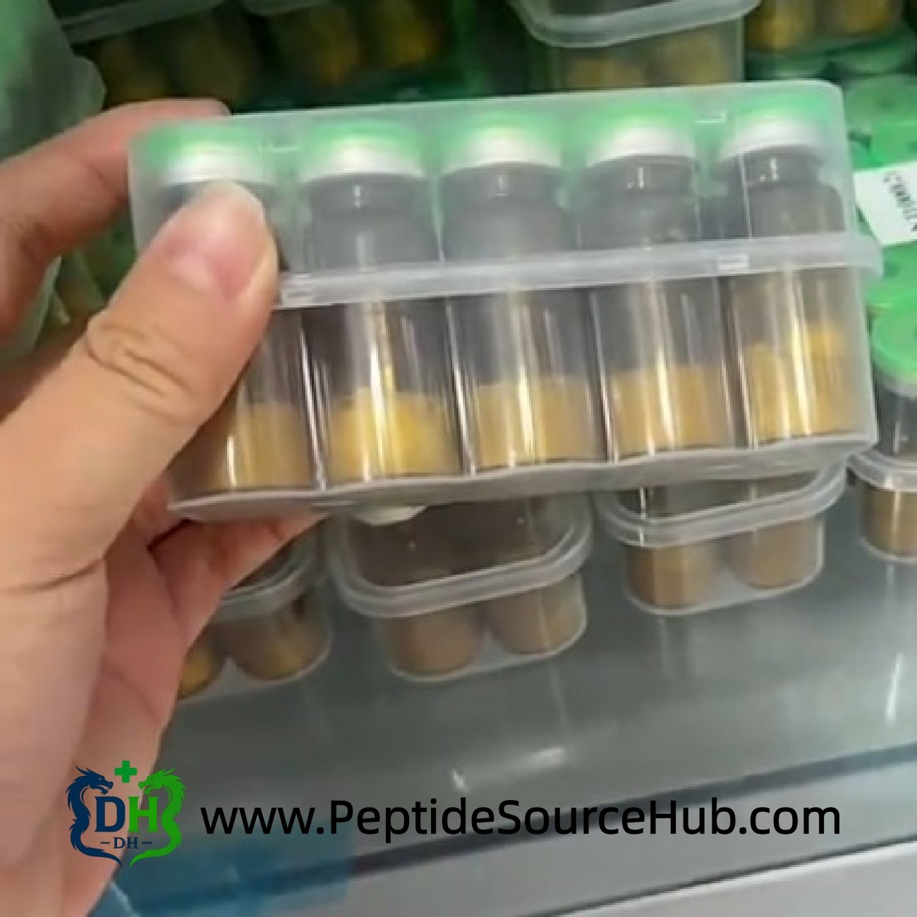 Tray of NAD+ amber vials with green caps