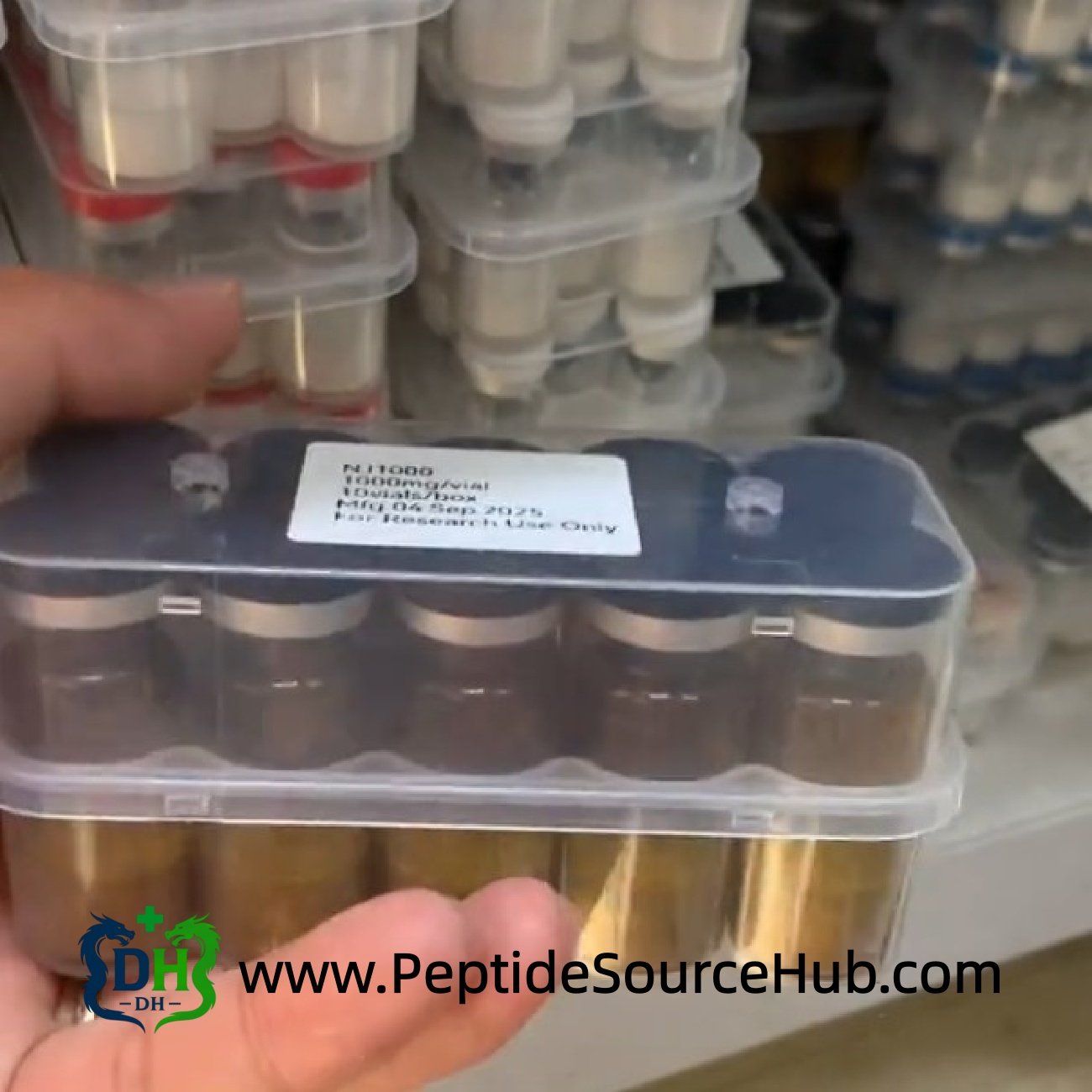 Hand holding NJ1000 NAD+ amber vial tray