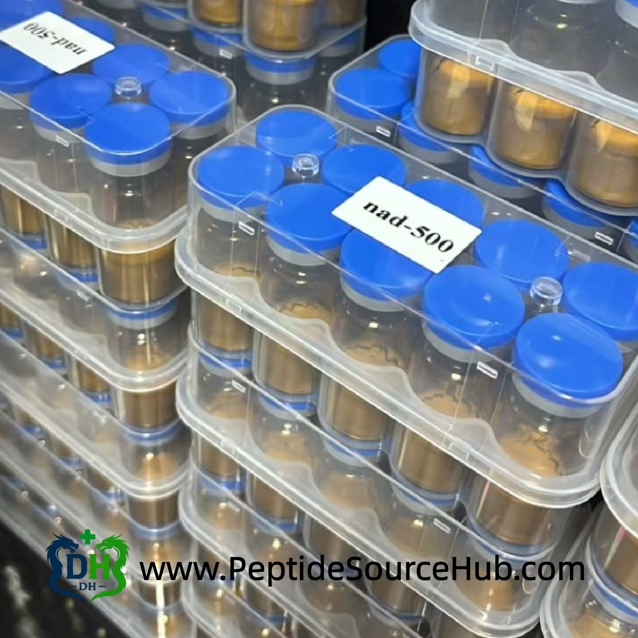 Stacked NAD+ 500 amber vial trays with blue caps