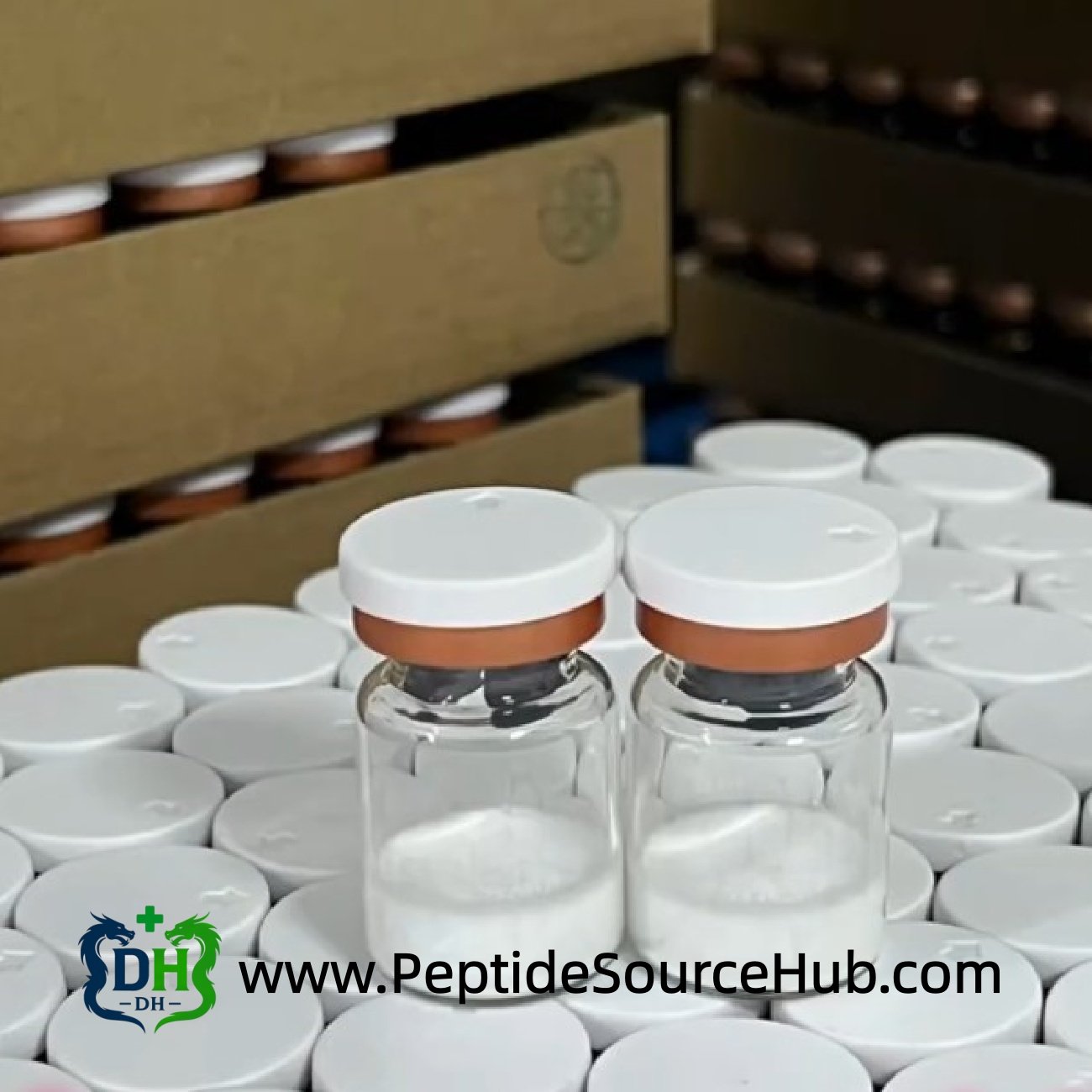 Close-up Oxytocin Acetate vials with white caps