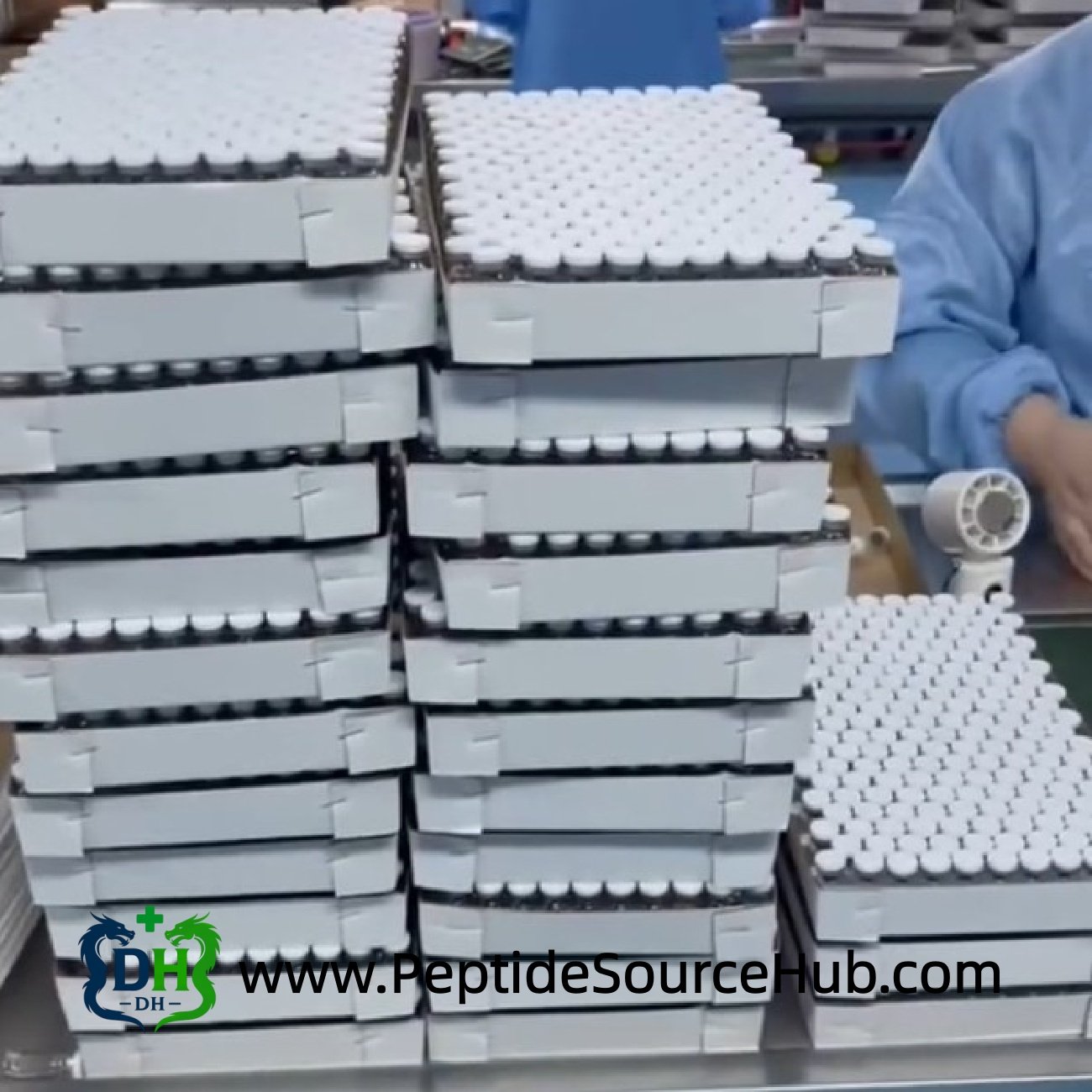 Trays of Oxytocin Acetate vials in production room