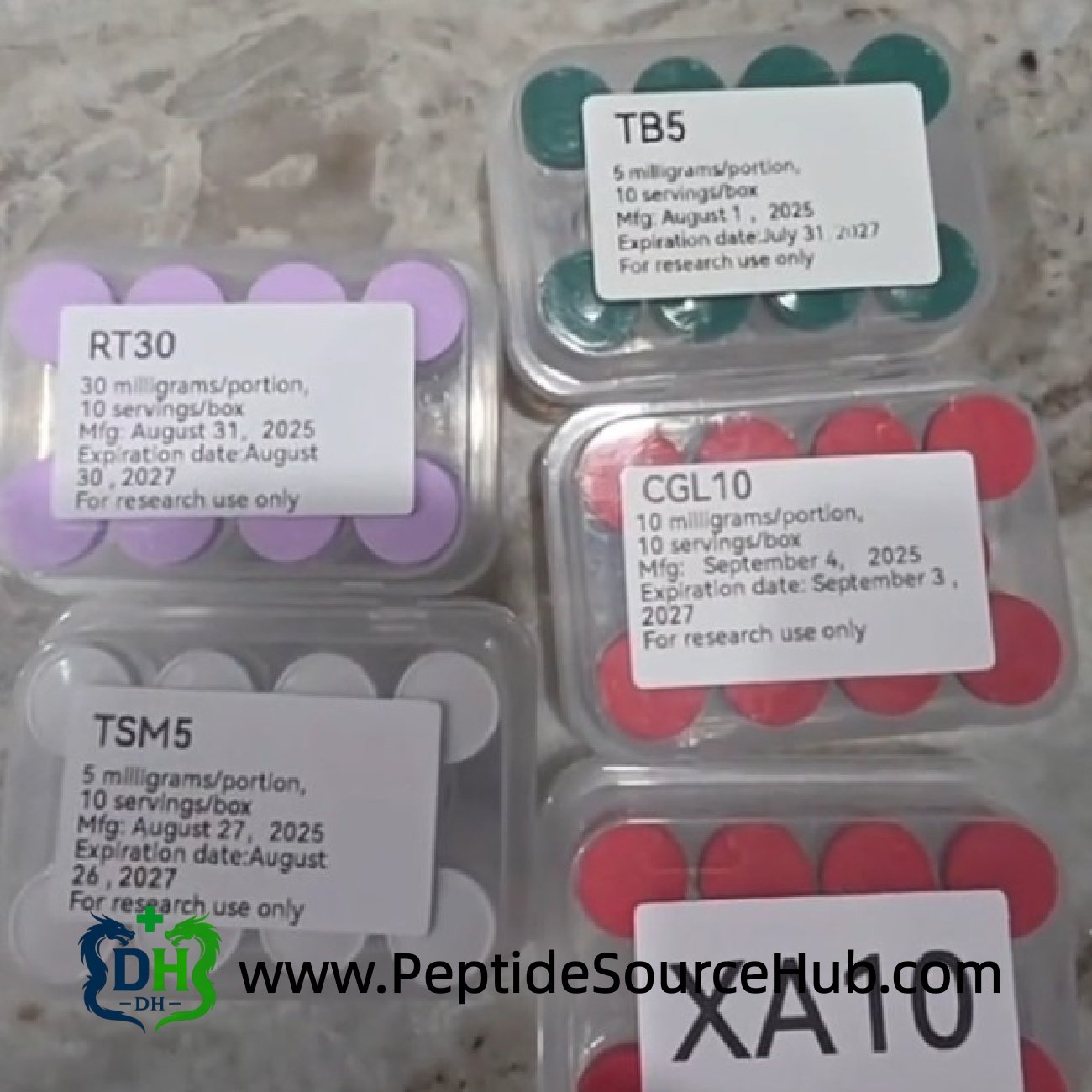 Assorted peptide kits with printed labels and colored caps