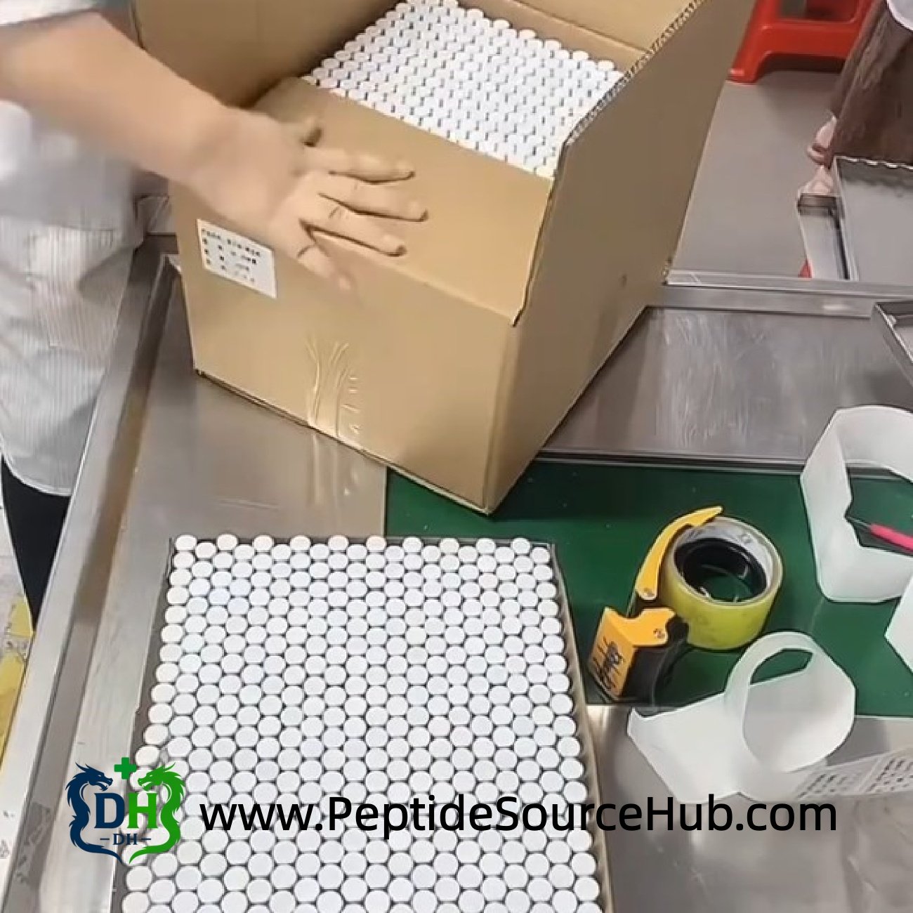 Packing box filled with peptide vial trays