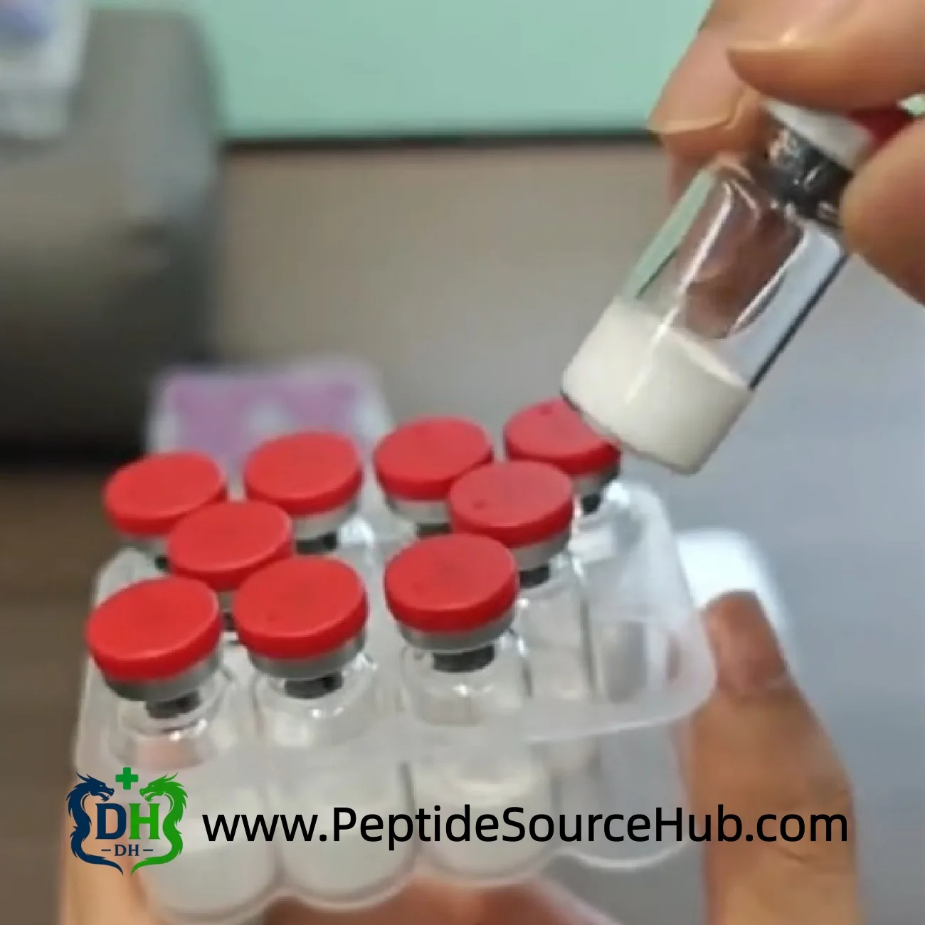 Hand checking a Survodutide 10 mg lyophilized vial