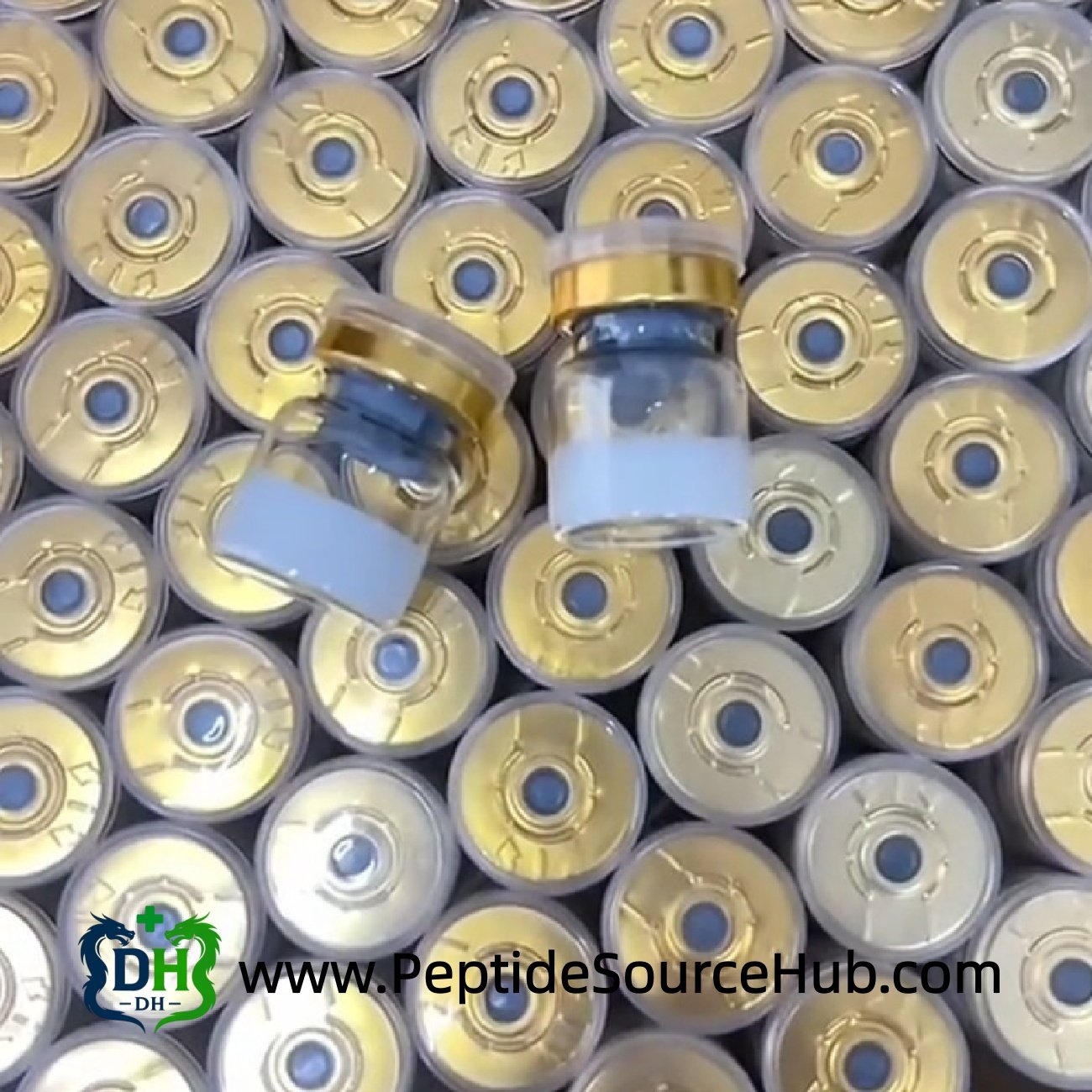 Overhead view of two peptide vials on dense gold caps