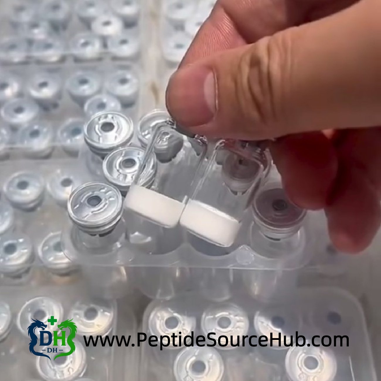 Two VIP peptide 10 mg vials on silver vial caps